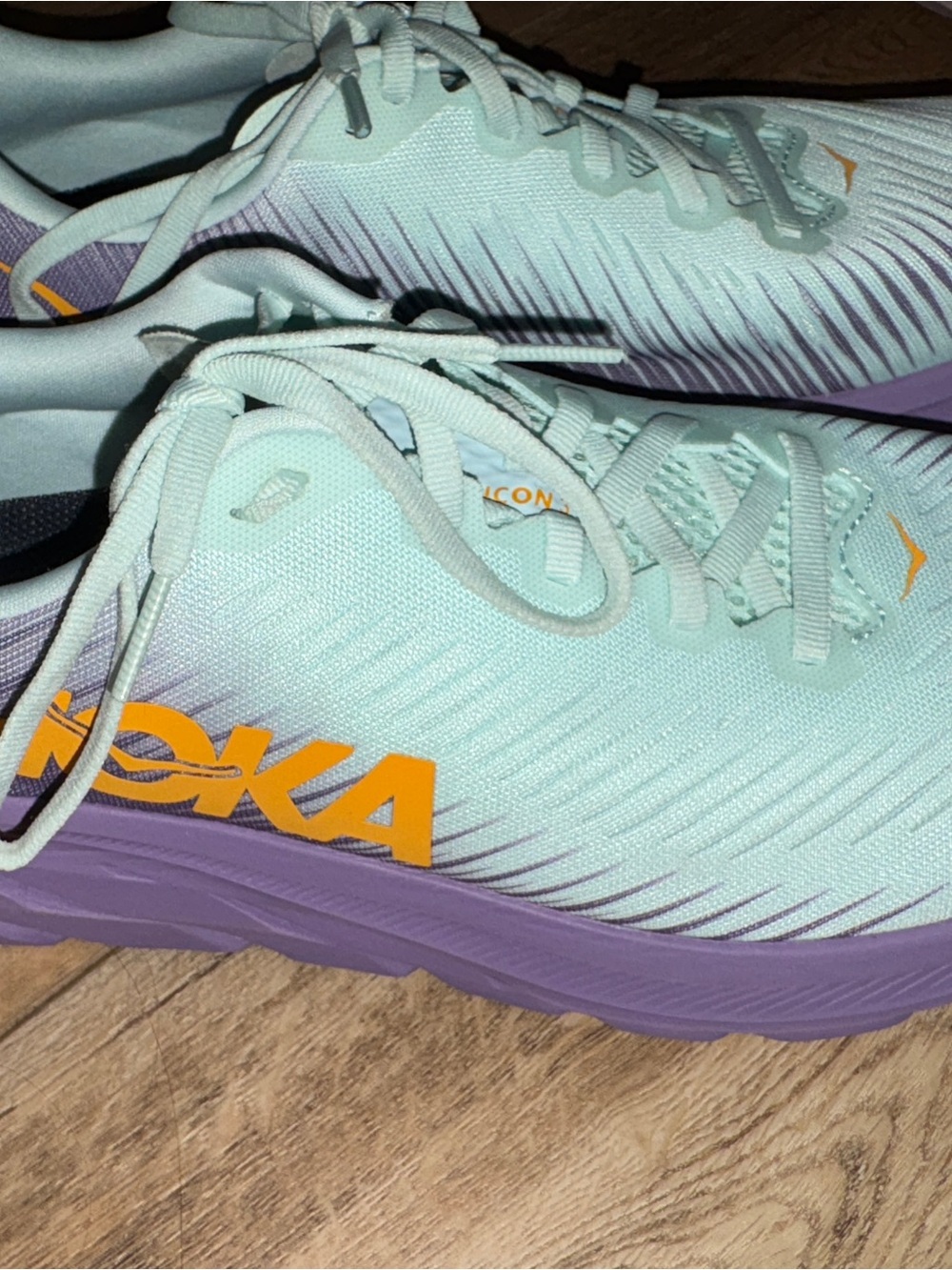 Hoka Women's Mint and Lavender Athletic Running Shoes with Orange Logo